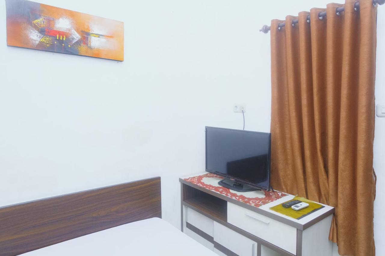 Lia Syariah Pettarani Wisma tamu Makassar
